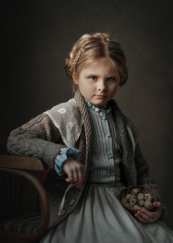 Girl with quail eggs