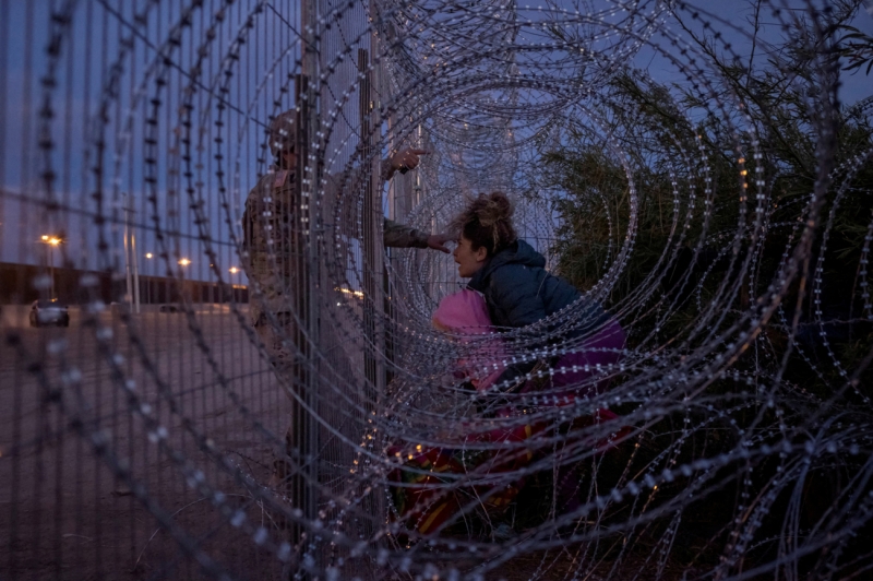 SOLDIER BLOCKS MIGRANT ENTRY INTO USA